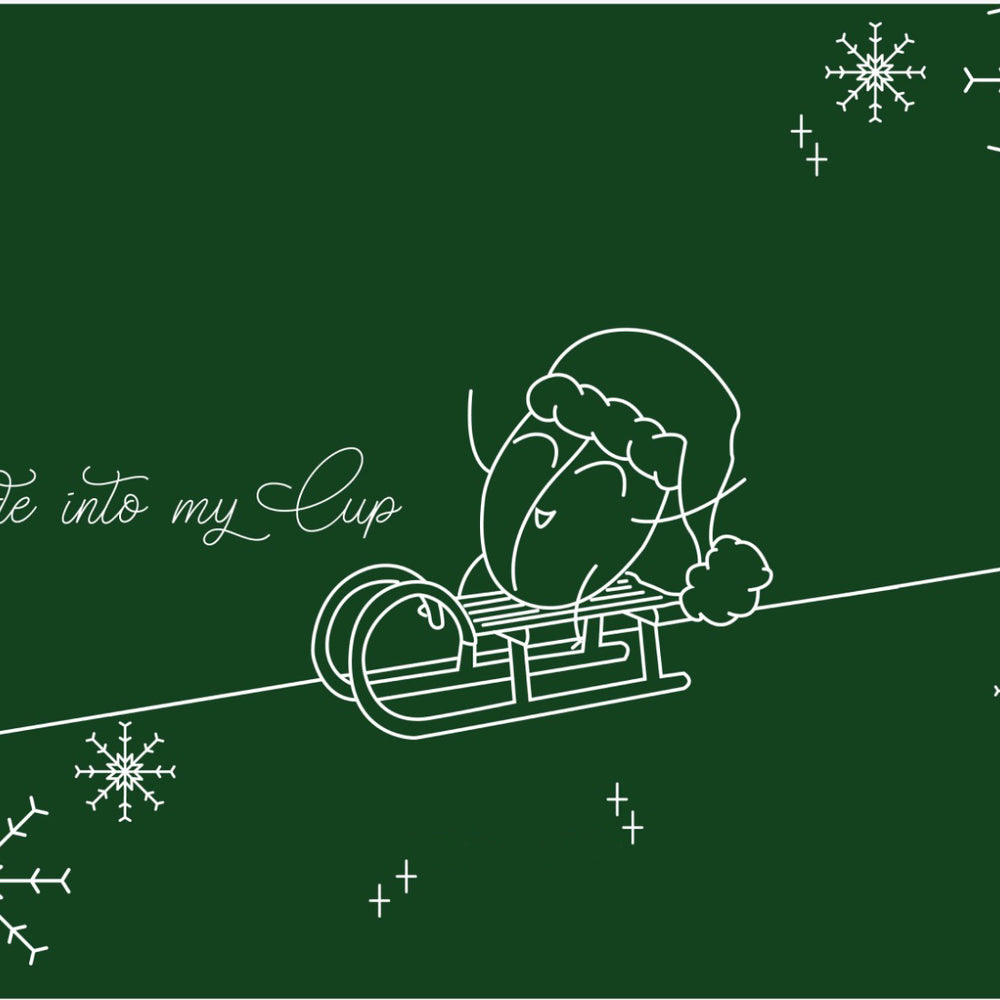 Kaffeebohne auf einem Schlitten weihnachtlich